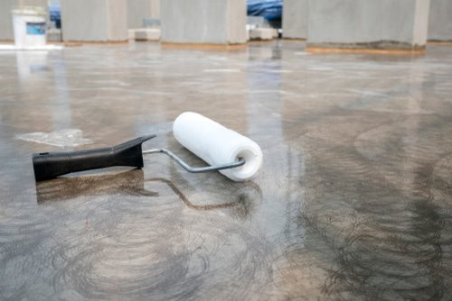 Mangelhaftigkeit eines Fußbodenbelags in Ladenlokal - Knackgeräusche / Auswölbung